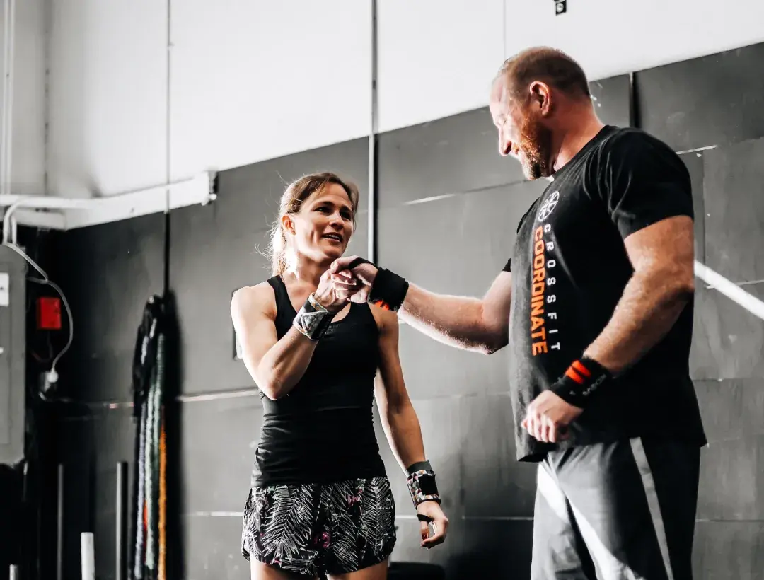 Coach checking in with a member at CrossFit Coordinate