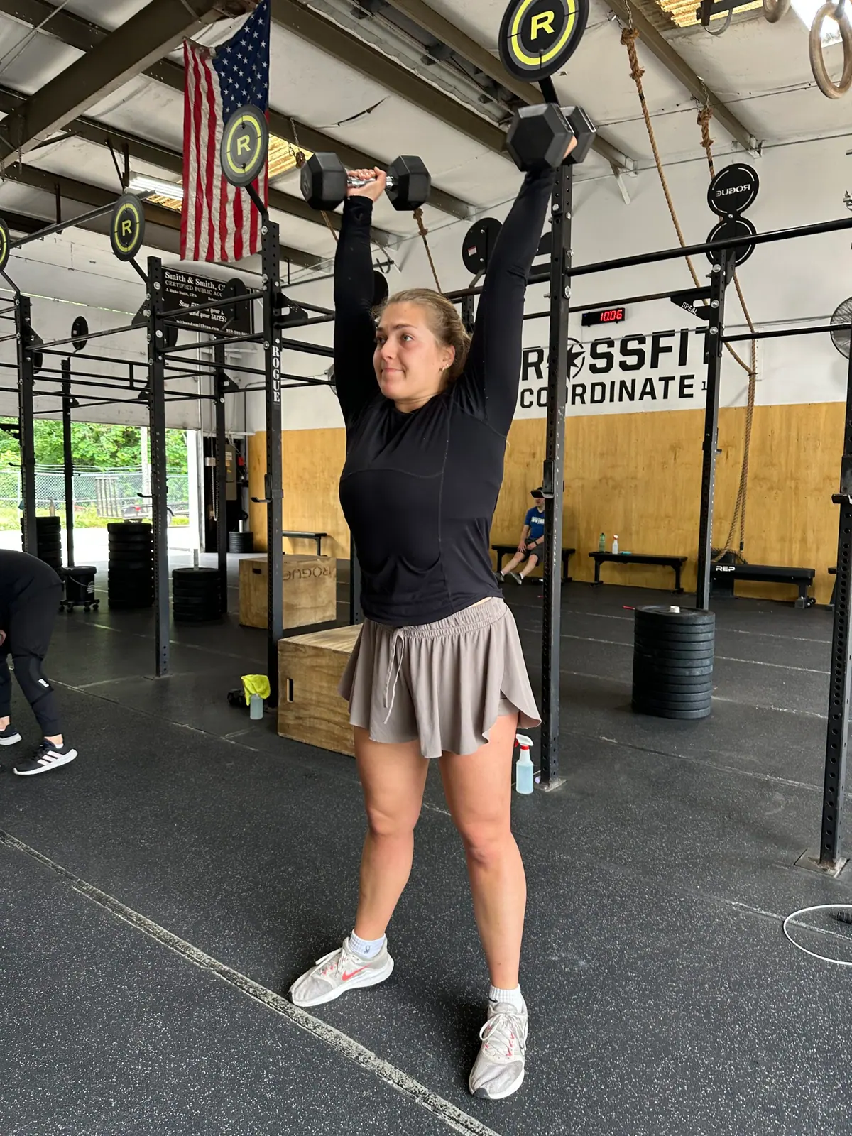 Camila celebrating after finishing a CrossFit class at CrossFit Coordinate, a family-friendly gym in Cary, NC
