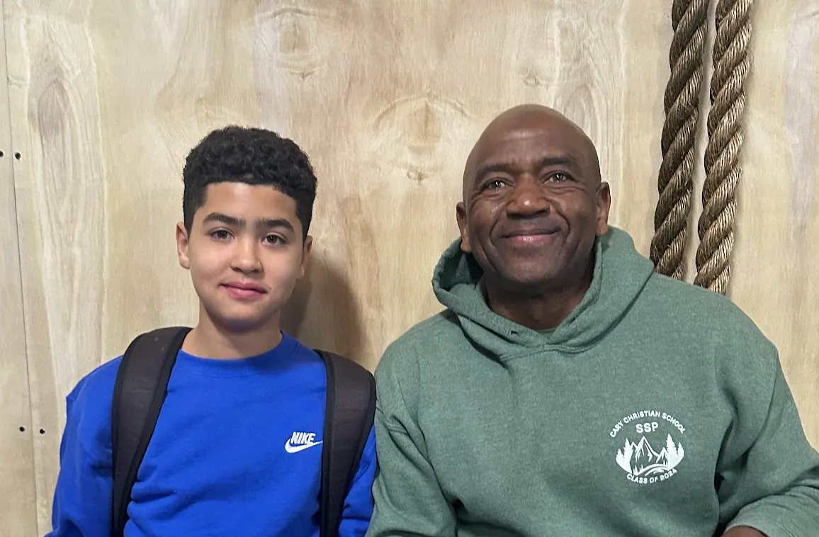 Jimi and his son relaxing at CrossFit Coordinate gym in Cary NC