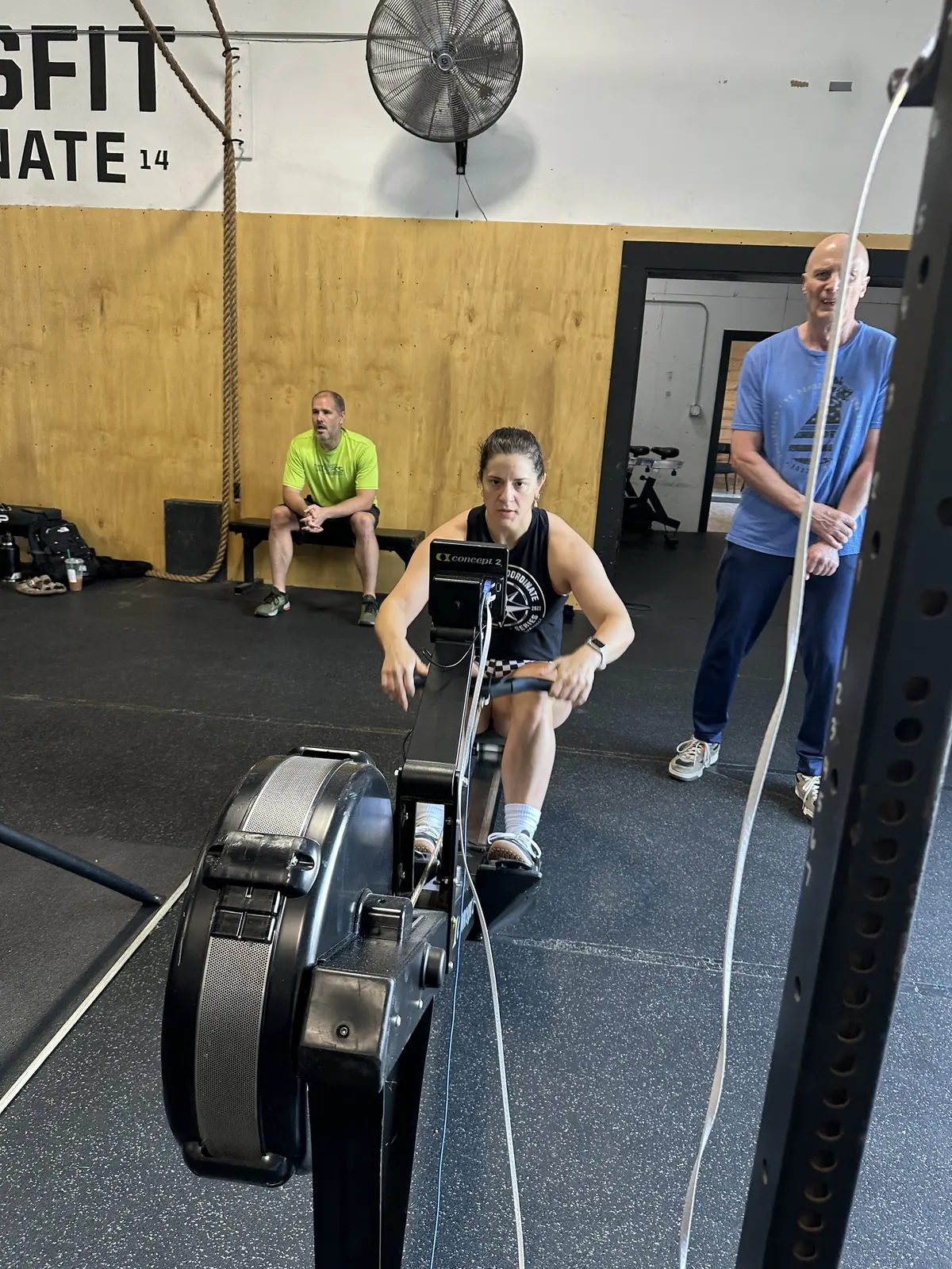 Athlete mid-pull on the Concept2 rower during the 5,000m row leg of the Ergathlon