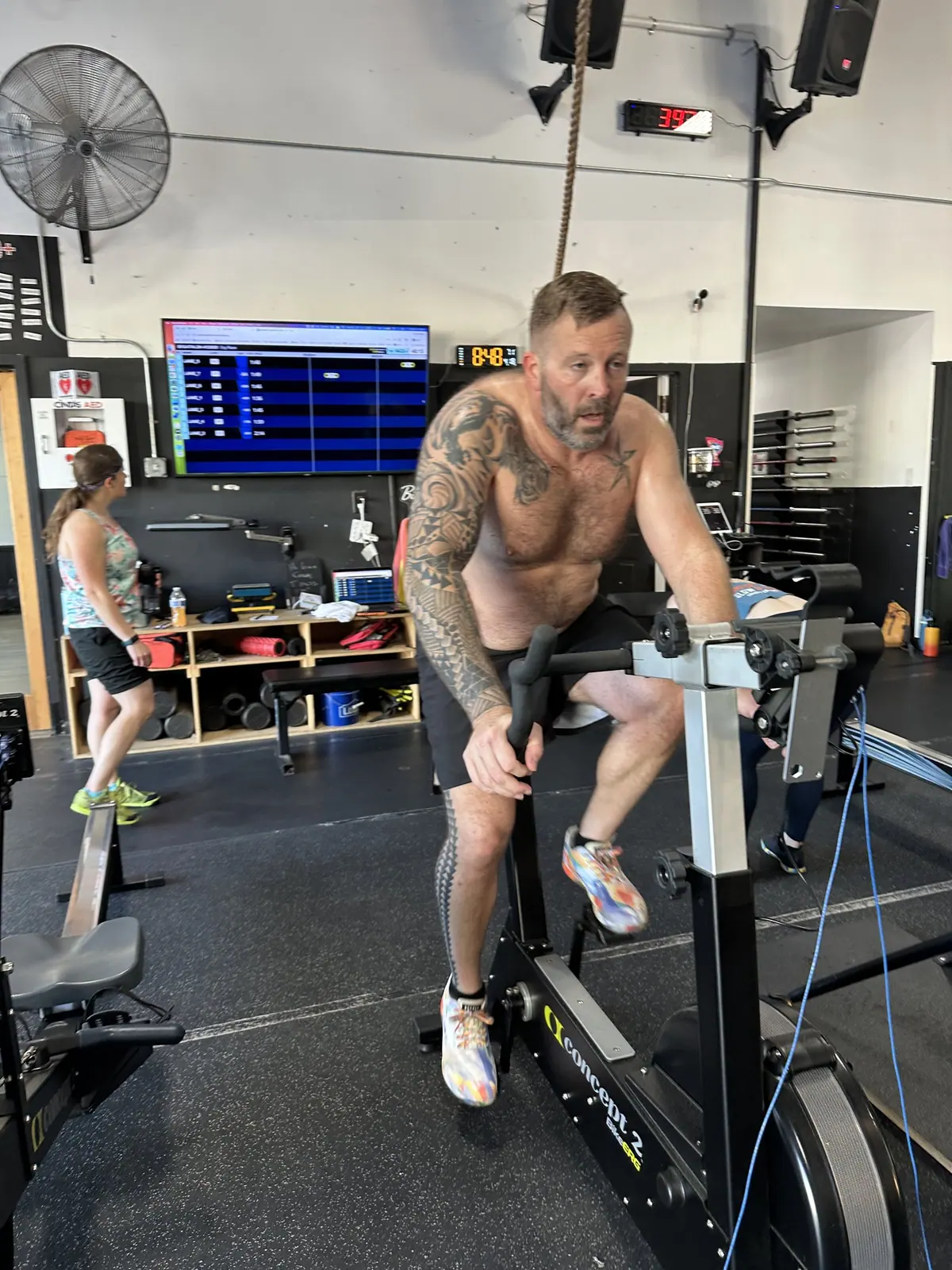 Athlete grinding through the middle of the 60-minute Ergathlon at CrossFit Coordinate