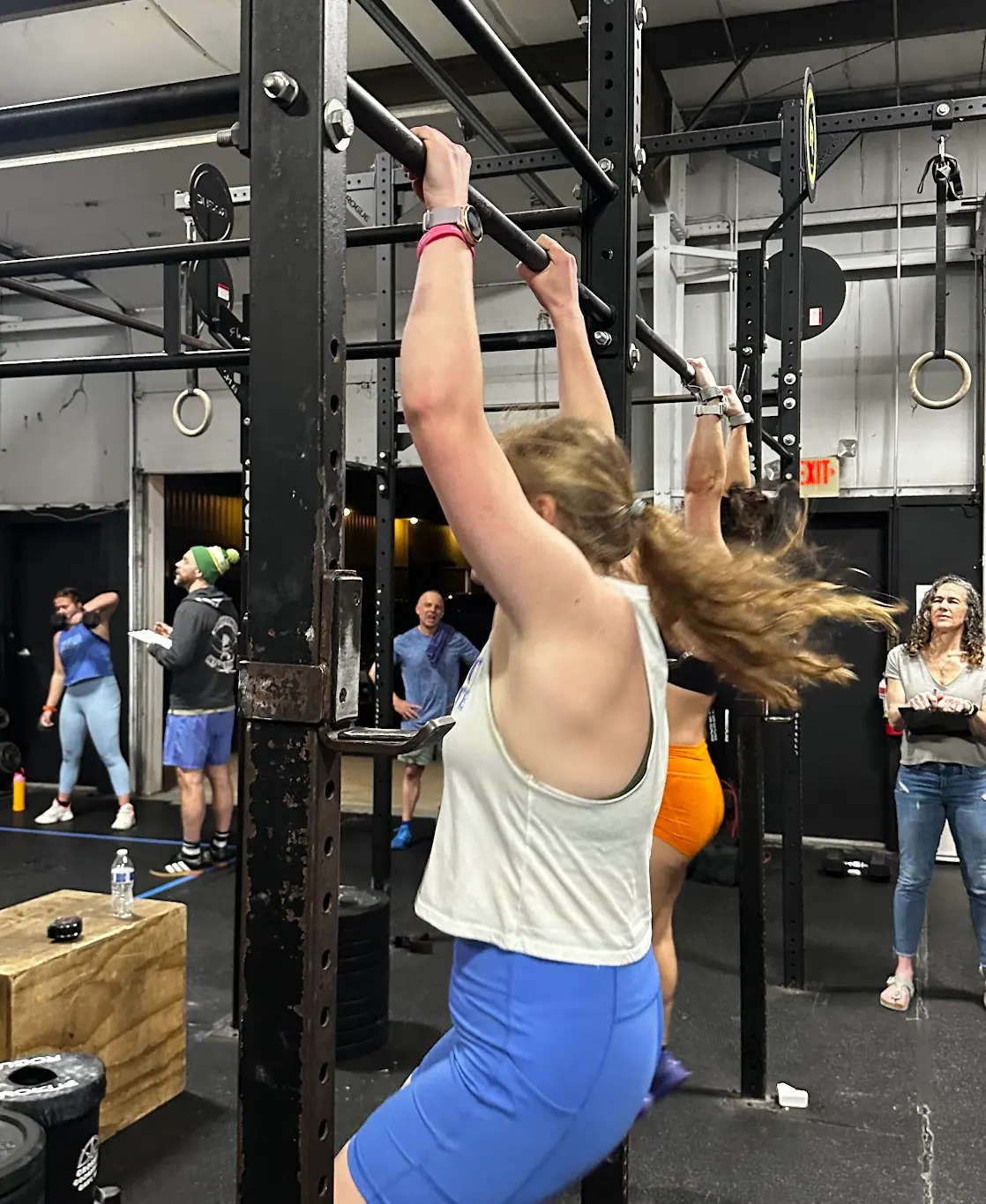 CrossFit Coordinate member performing thrusters during Fran at the Cary, NC gym