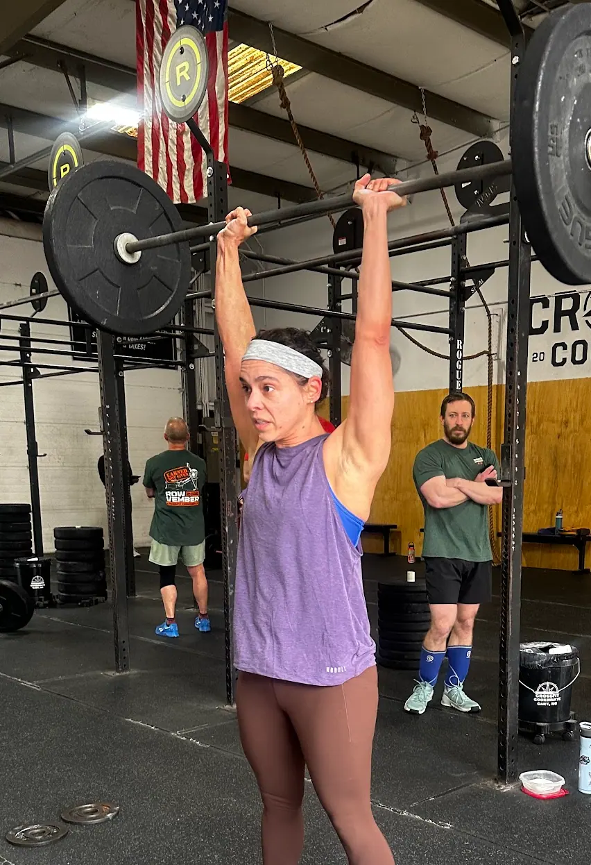 CrossFit Coordinate member performing a clean and jerk during Grace at the Cary, NC gym