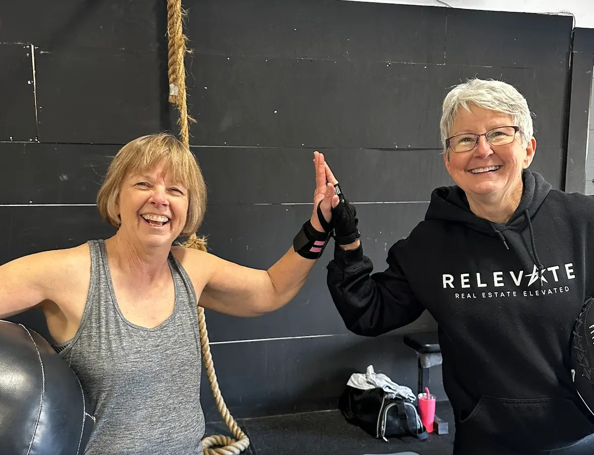Adults over 40 training at CrossFit Coordinate gym in Cary NC - functional fitness class for mature adults